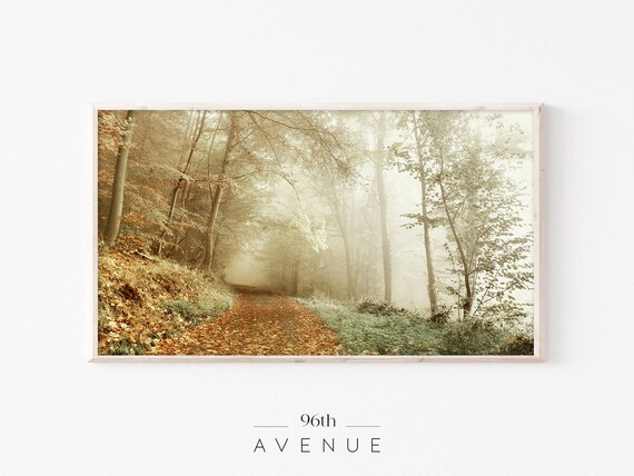Misty Autumn Forest Path Covered in Fallen Golden Leaves Poster