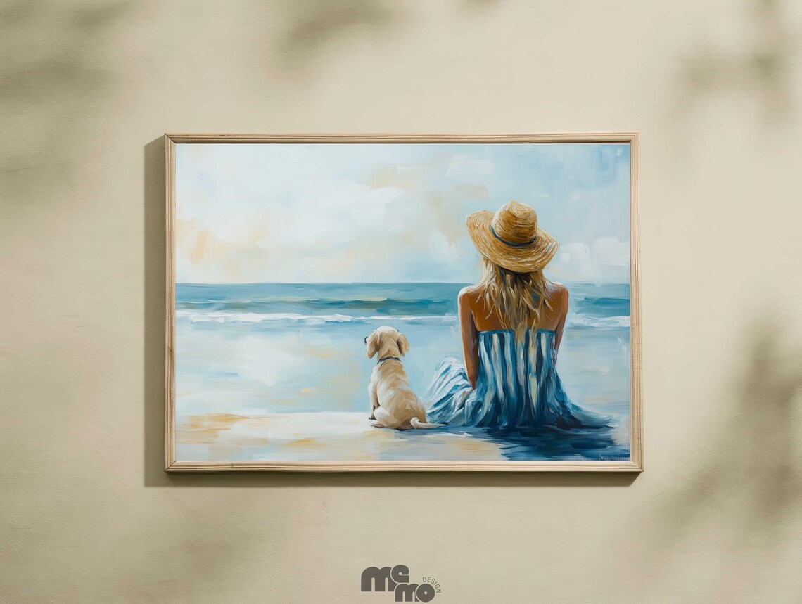 Woman And Golden Retriever Puppy Sitting By The Sea Shore Poster