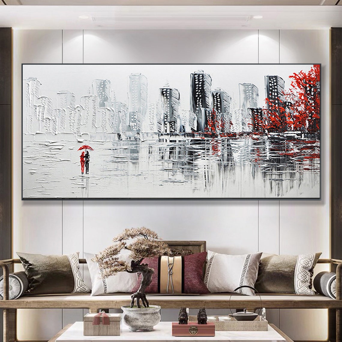 Couple Under Red Umbrella in White Cityscape With Red Trees Poster - Image 6