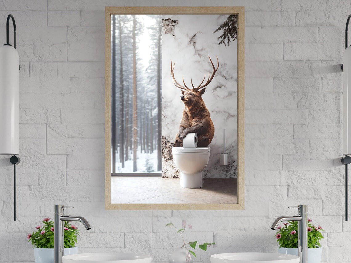 Deer Sitting on Toilet Holding Toilet Paper in a Snowy Forest Bathroom Poster