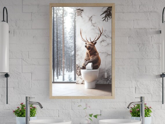 Deer Sitting on Toilet Holding Toilet Paper in a Snowy Forest Bathroom Poster