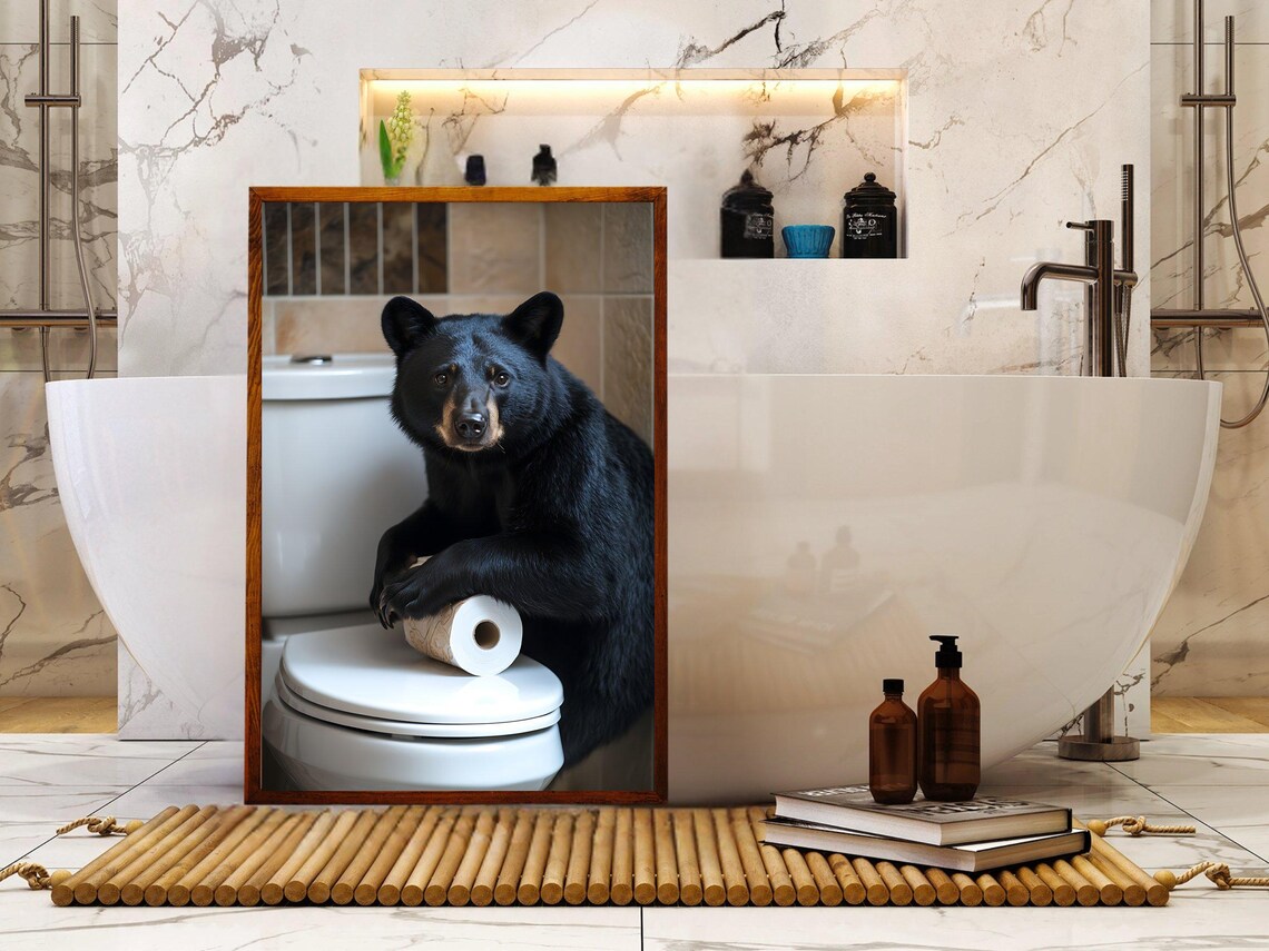 Black Bear Leaning on a Toilet With a Roll of Toilet Paper Poster - Image 5