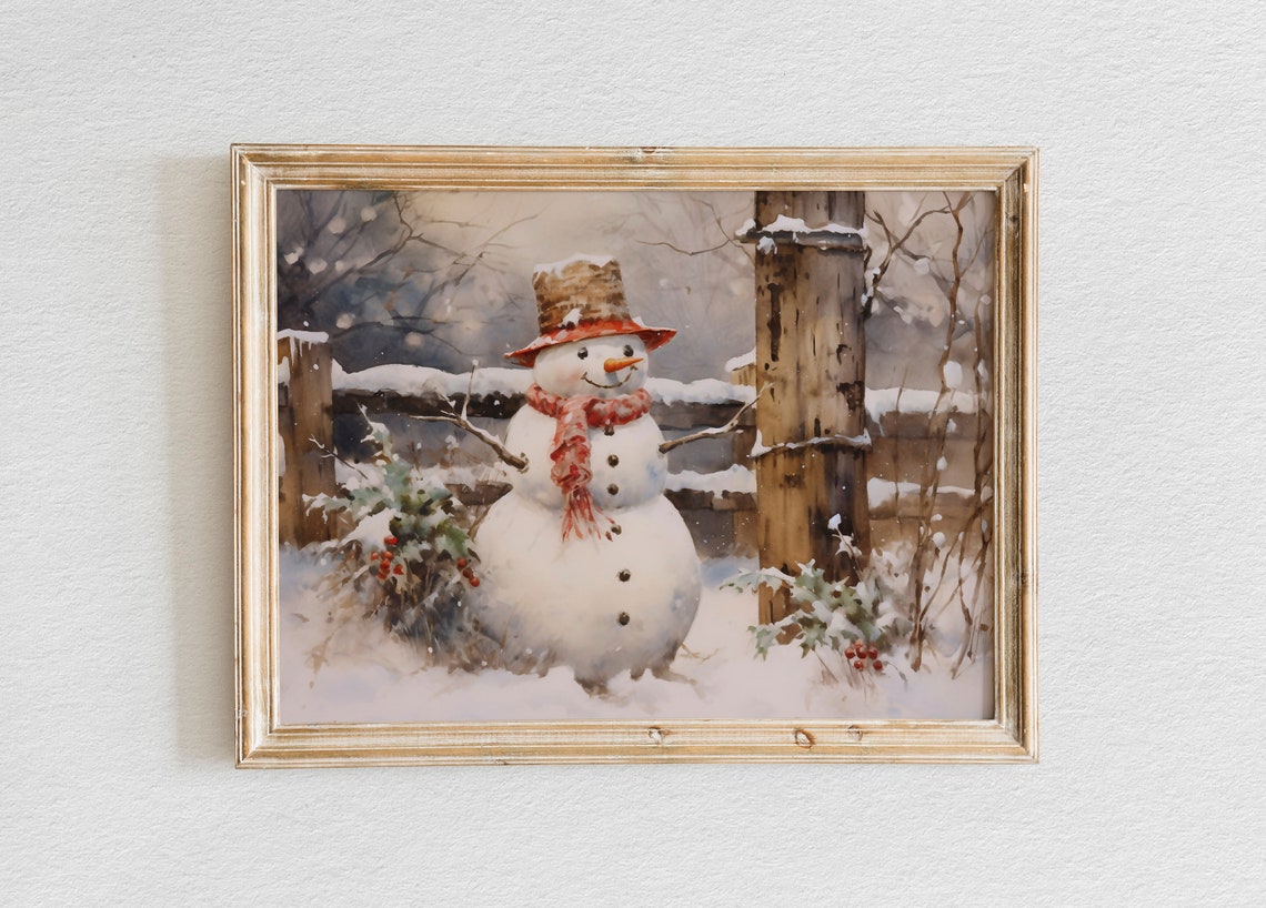 Snowman with Red Scarf and Top Hat Beside a Snowy Fence Poster
