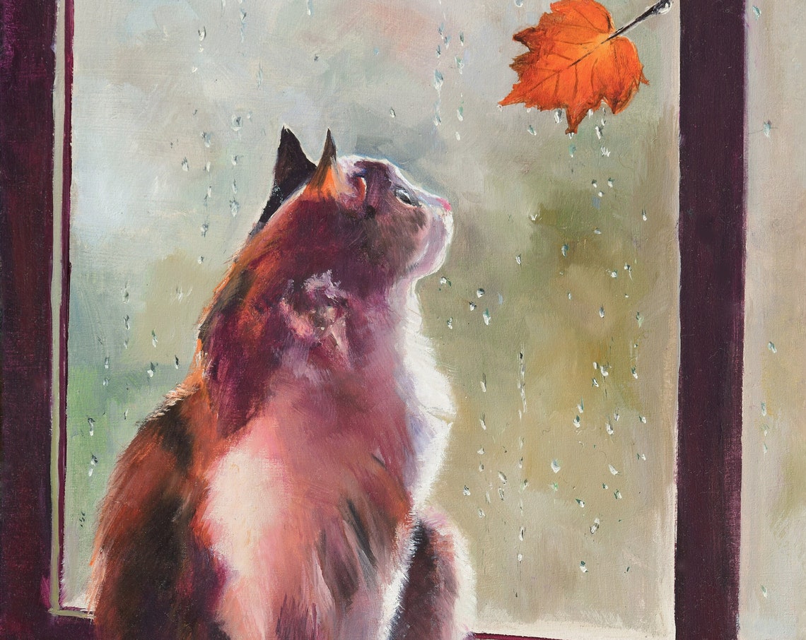Cat Watching an Orange Maple Leaf on a Rainy Windowpane Poster