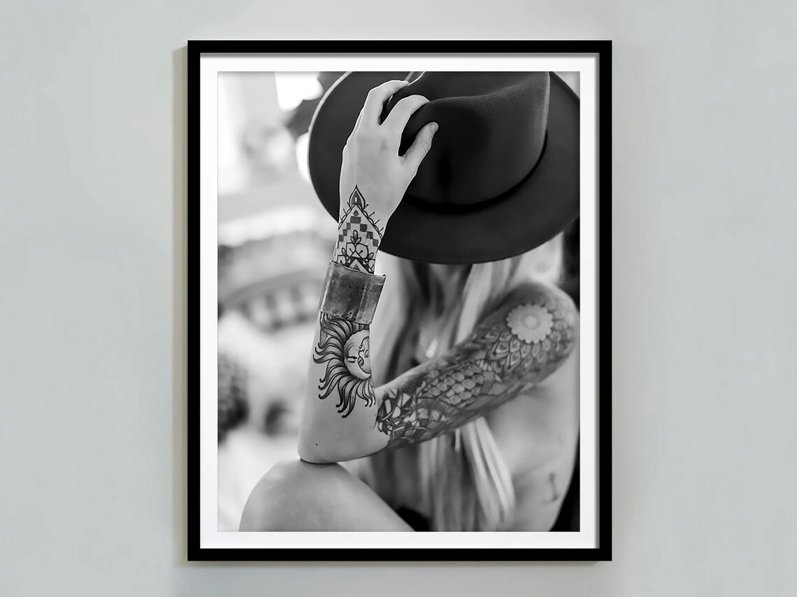 Tattooed Woman Holding Cowboy Hat Over Face Black and White Poster