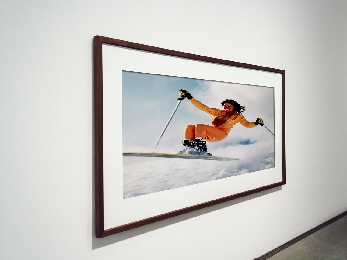Vintage Skier Woman In Orange Jumpsuit Mid Air Jump Retro Ski Poster - Image 4