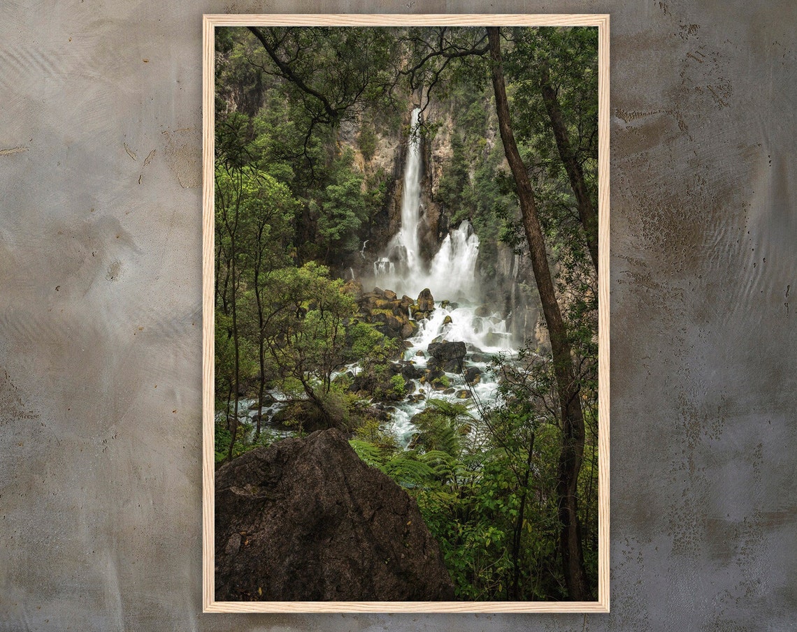 Wild Canyon Waterfall Plunging Into Rushing River Below Cliffs Poster