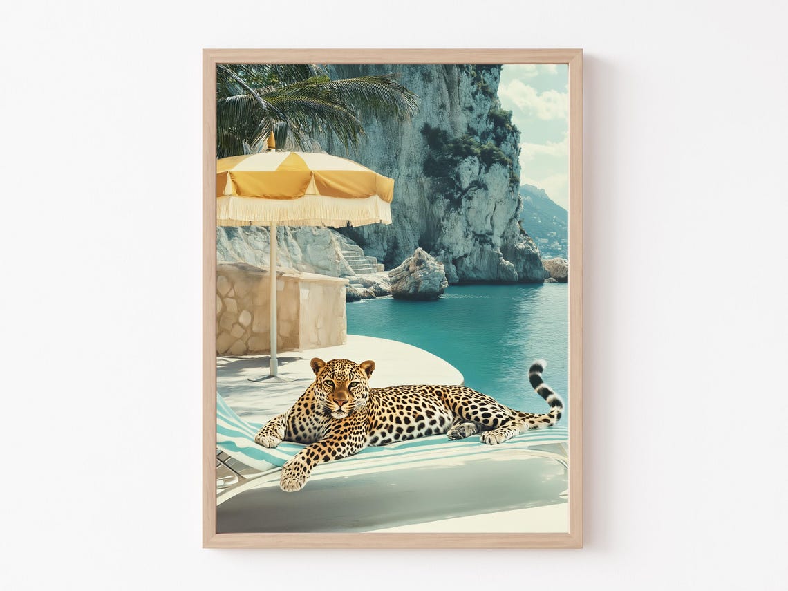 Escapist Leopard Reclining on a Lounger by a Turquoise Cove Poster