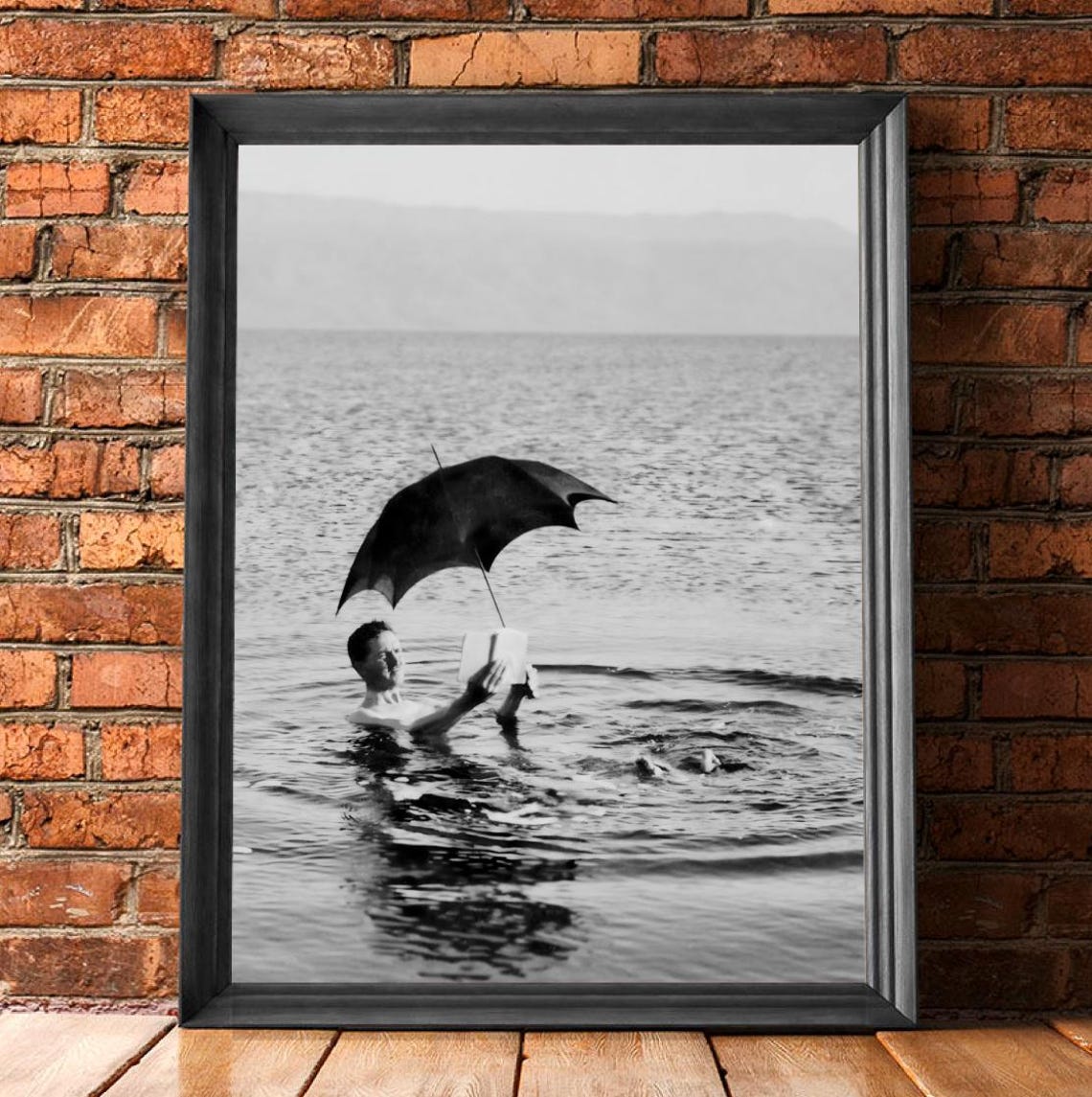 Reading in the Dead Sea Vintage Black and White Photo Poster - Image 2