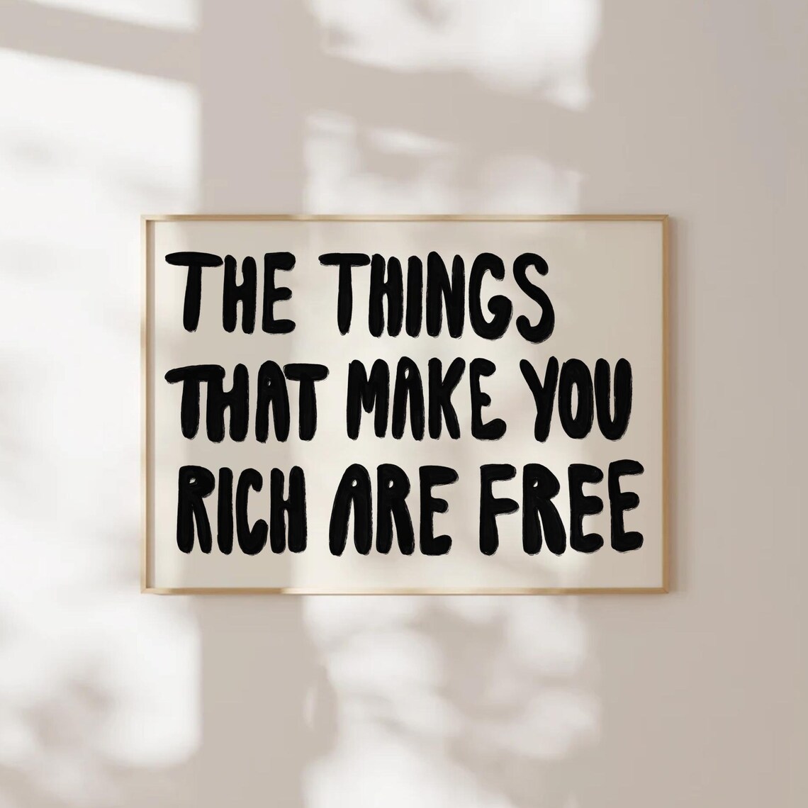 The Things That Make You Rich Are Free Black Brush Quote Poster