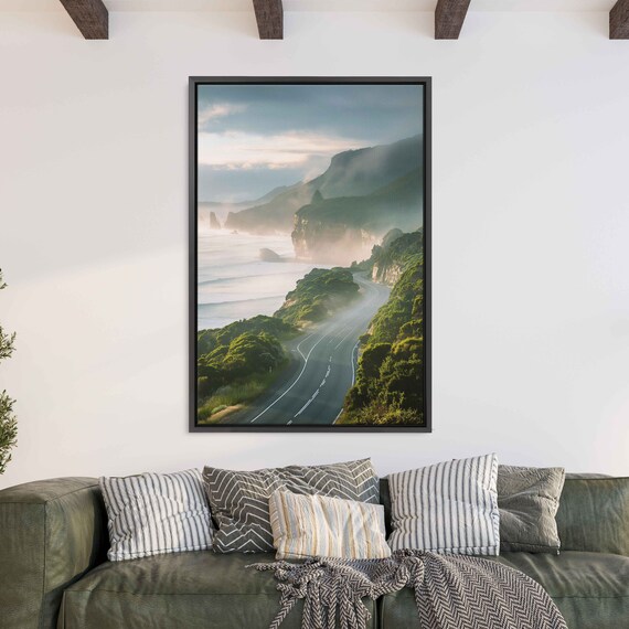 Misty Seaside Road With Towering Cliffs and Ocean View at Sunrise Travel Poster