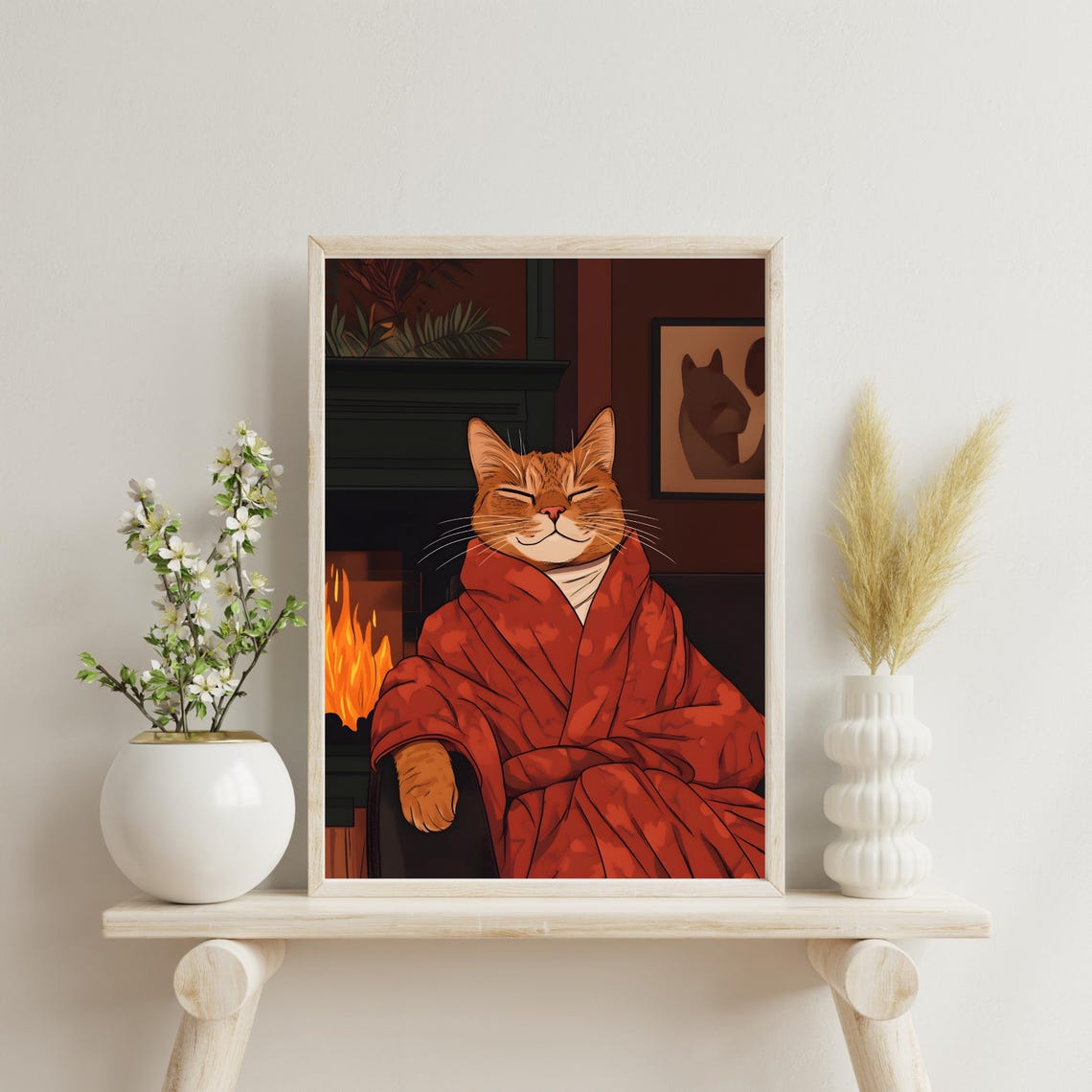 Cozy Ginger Cat in a Red Robe Relaxing by the Fireplace Poster - Image 3