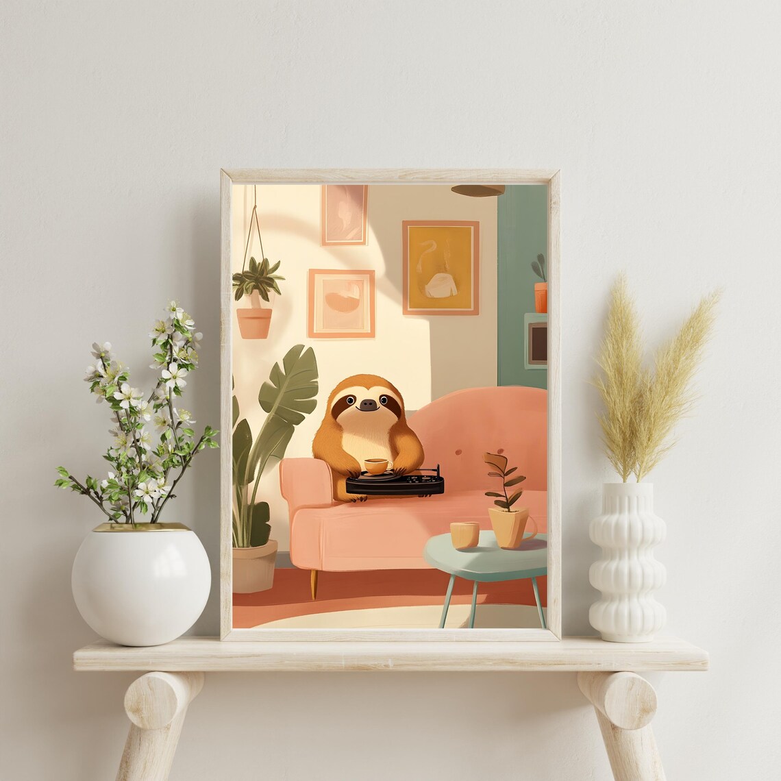 Content Sloth Relaxing on a Pink Sofa With a Cup of Tea and a Laptop Poster - Image 2