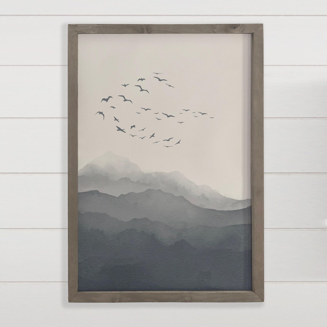 Calm Gray Misty Mountains With a Flock of Birds Flying Art Print