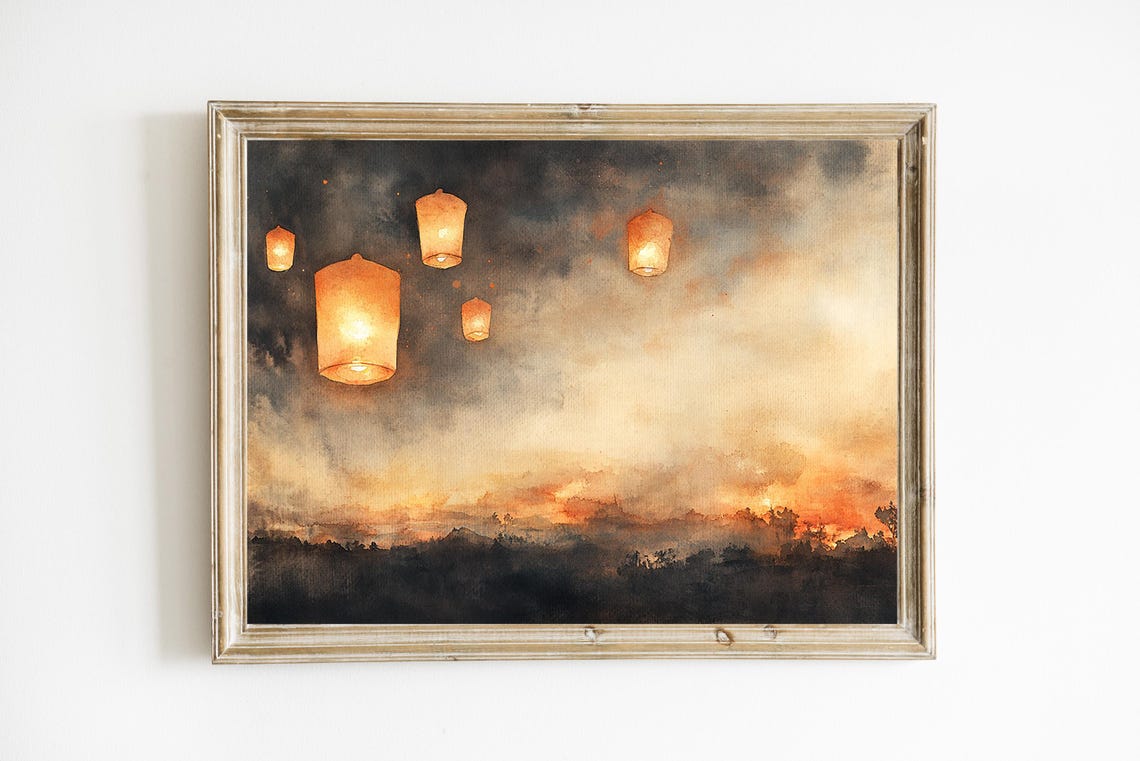 Floating Sky Lanterns Rising Over a Glowing Sunset Watercolor Print