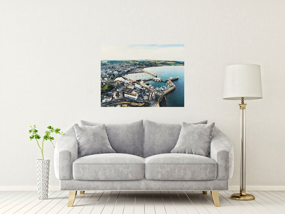 Aerial View of a Seaside Harbor Town with Marina at Golden Hour Poster - Image 2