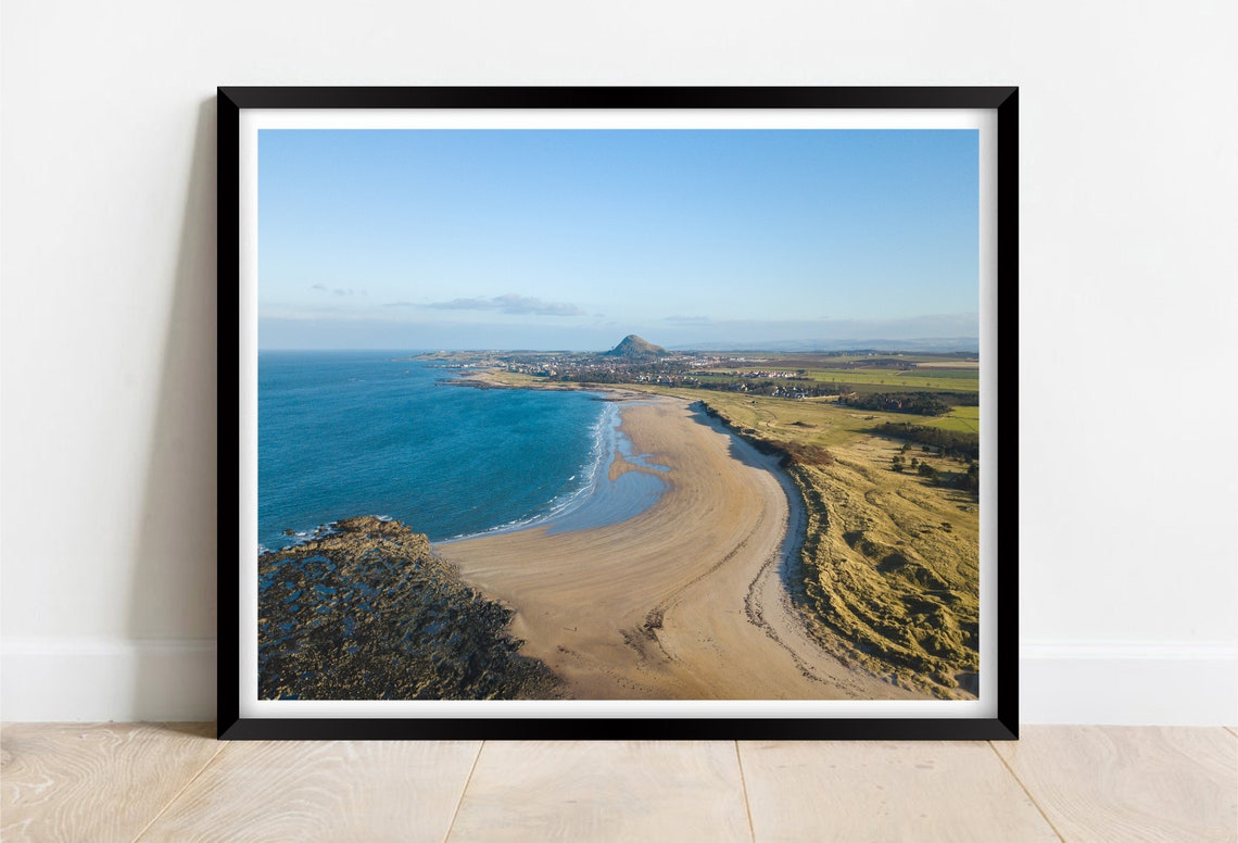 Aerial View of a Curving Sandy Beach Sweeping Around a Bay Poster