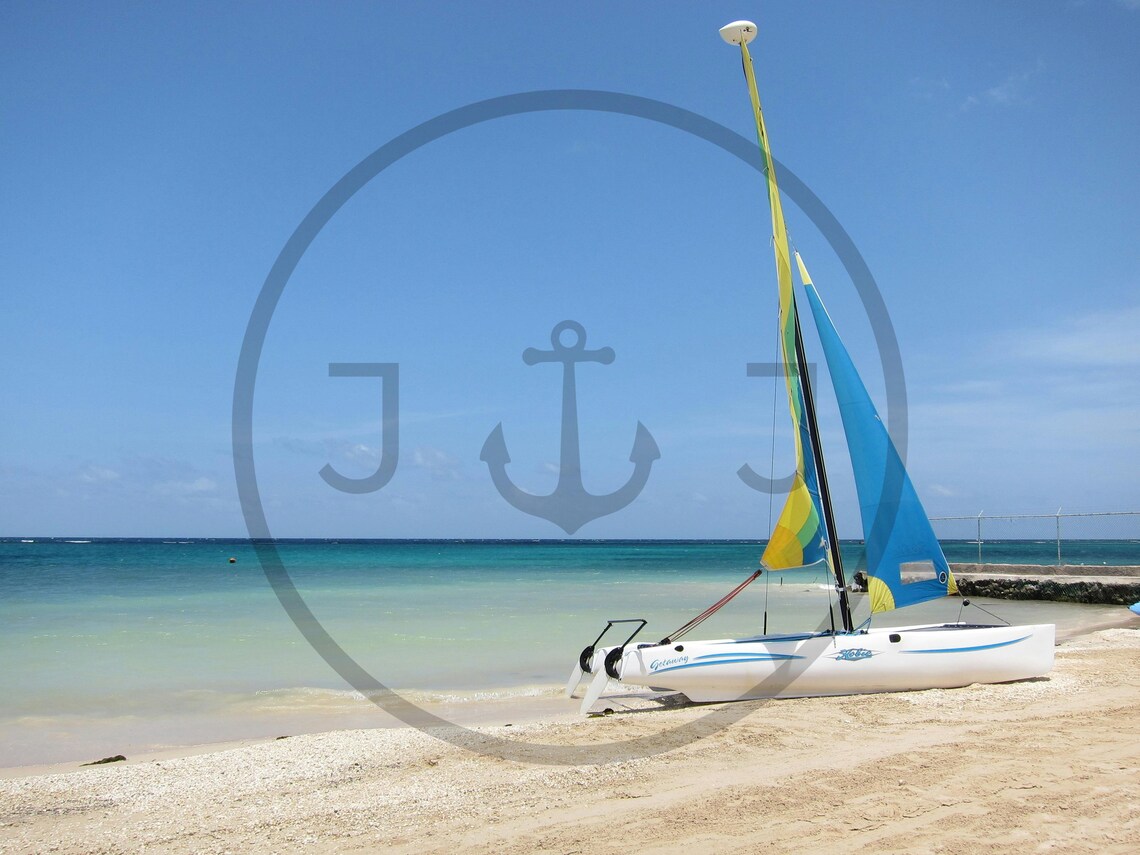 Catamaran Sailboat on White Sand Beach Turquoise Sea Day Poster - Image 3