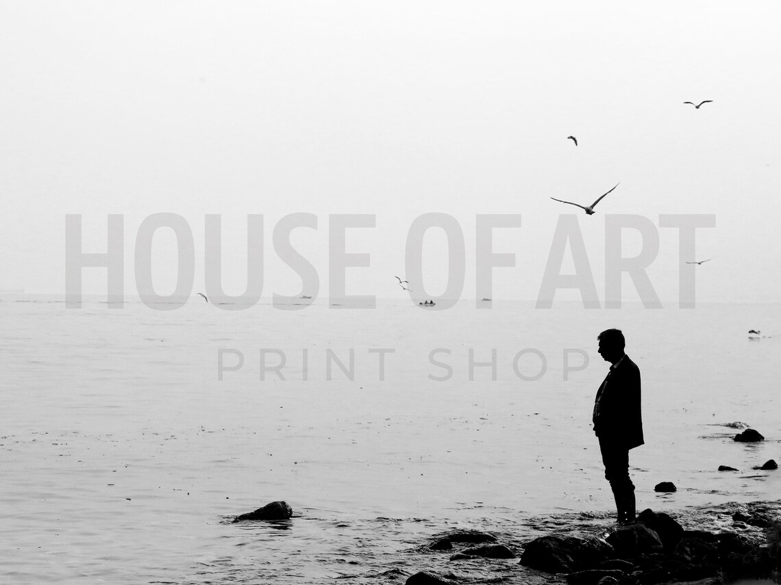 Minimalist Black And White Photo Man On Rocky Shore Birds Wall Art Print - Image 2