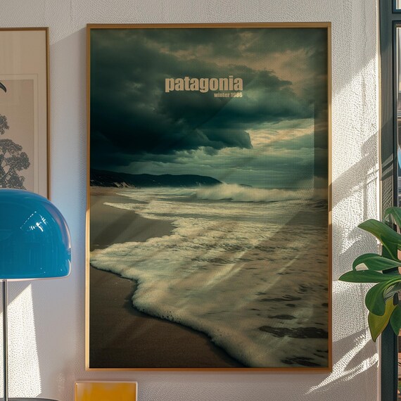 Patagonia Winter 1986 Stormy Beach Poster with Dramatic Clouds