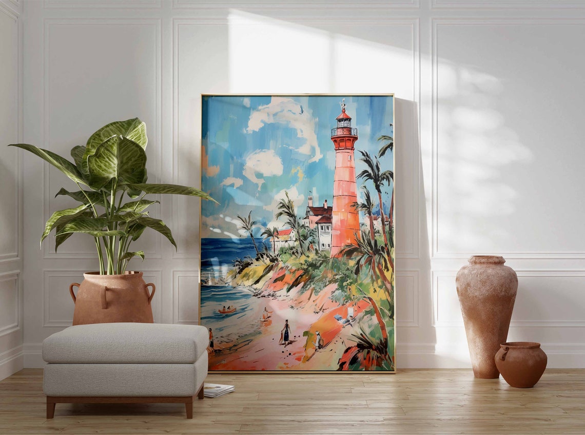 Orange Lighthouse on a Palm Covered Cliff Above the Beach Poster - Image 3