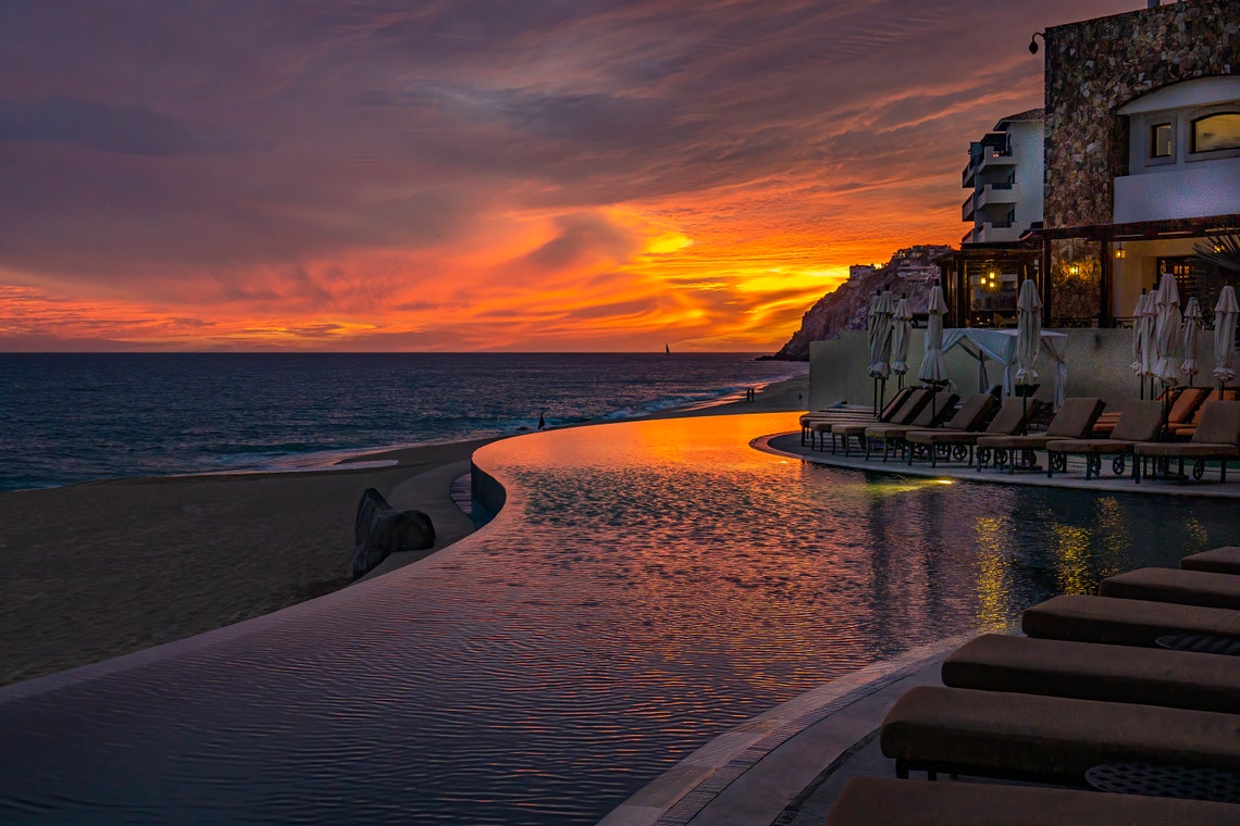 Infinity Pool At Sunset Orange Sky Beach Resort Cabo San Lucas Poster