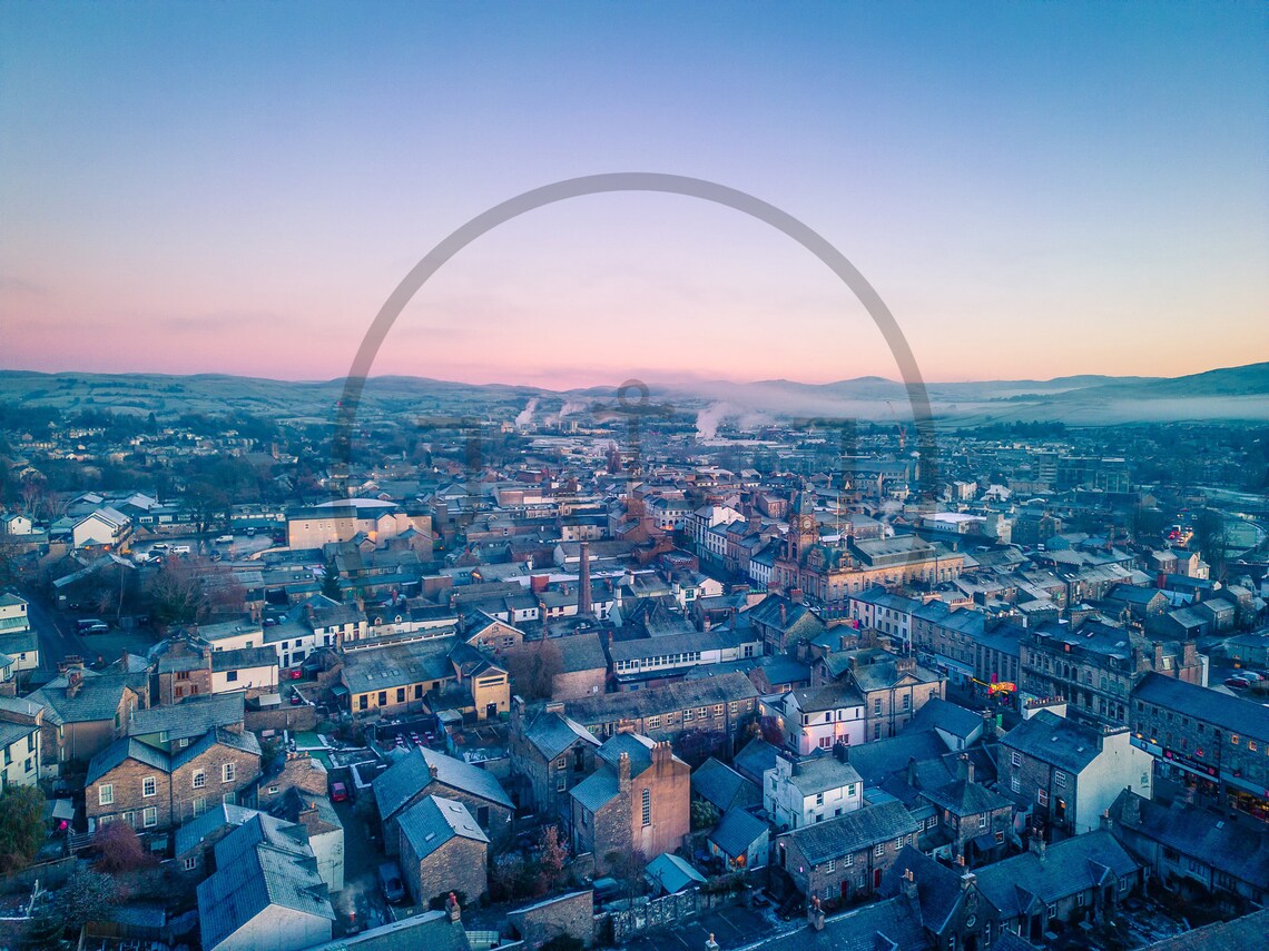 Aerial View of a Historic Old Town and Its Rooftops at Dawn Poster - Image 3