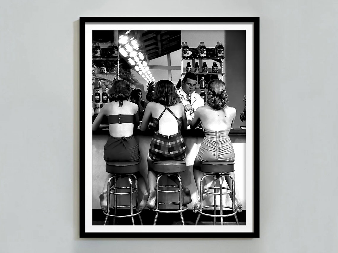 Three Women Sitting at Bar With Bartender Black and White Retro Poster