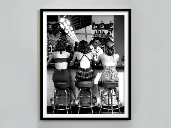 Three Women Sitting at Bar With Bartender Black and White Retro Poster