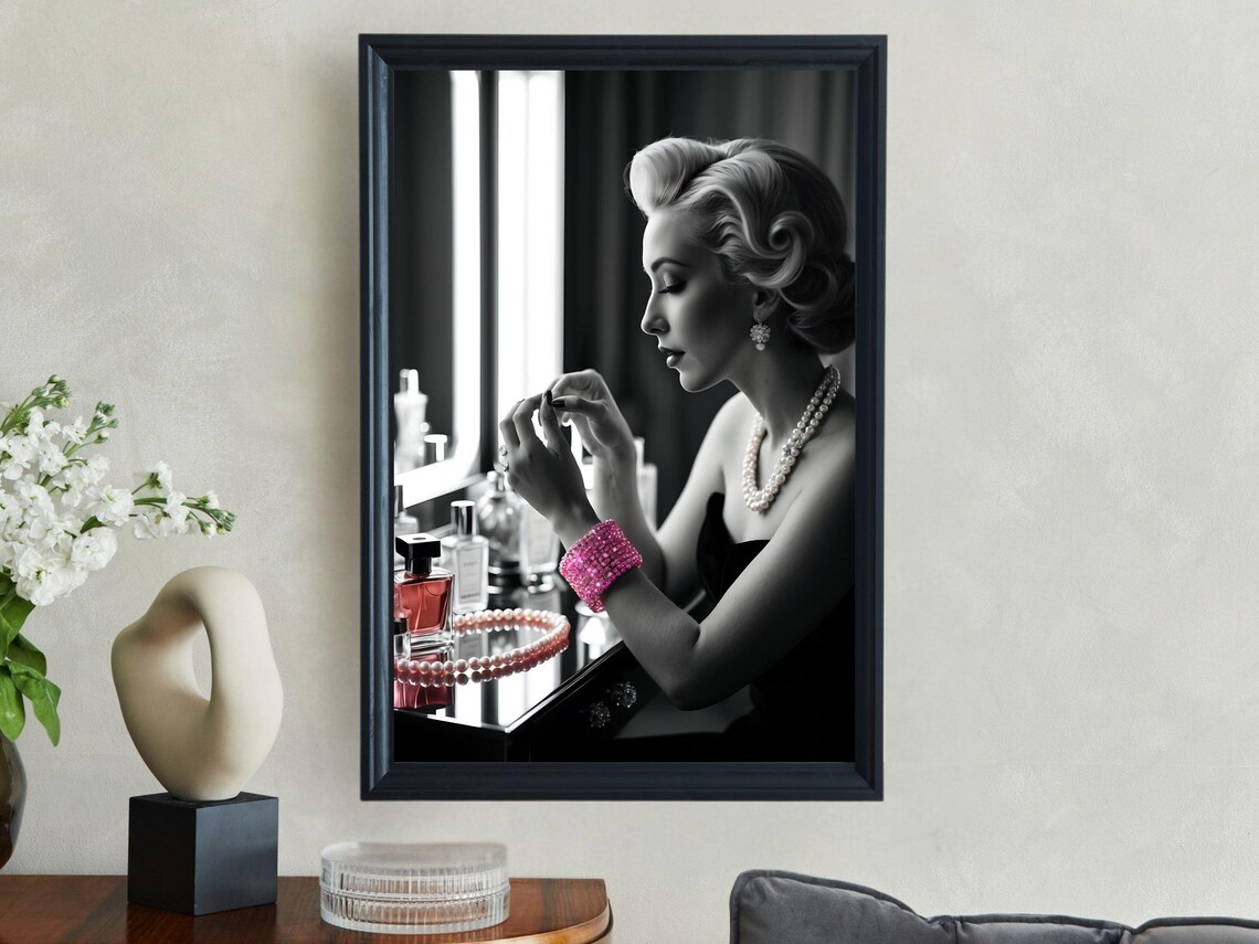 Elegant Woman Applying Lipstick At Vanity With Pearl Necklace Poster - Image 4