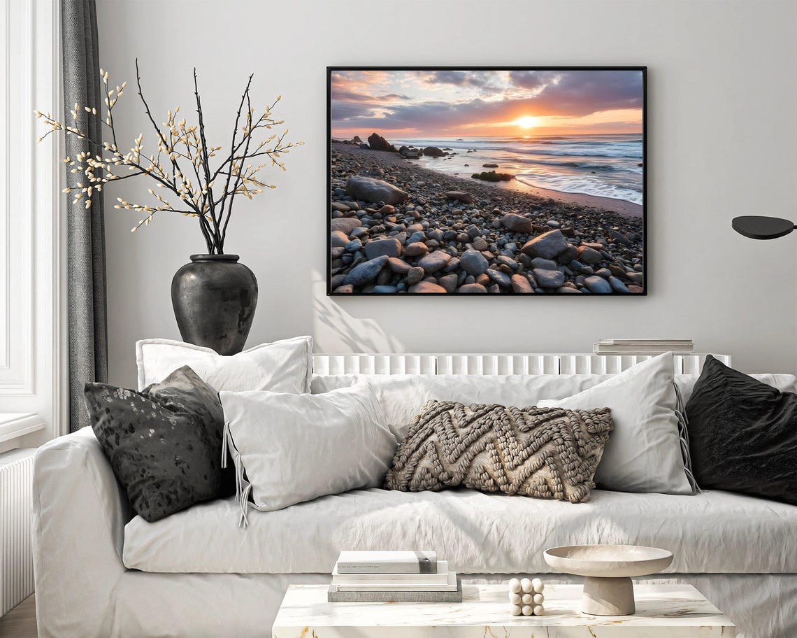 Sunset Over a Rocky Pebble Beach with Rolling Ocean Waves Poster - Image 4