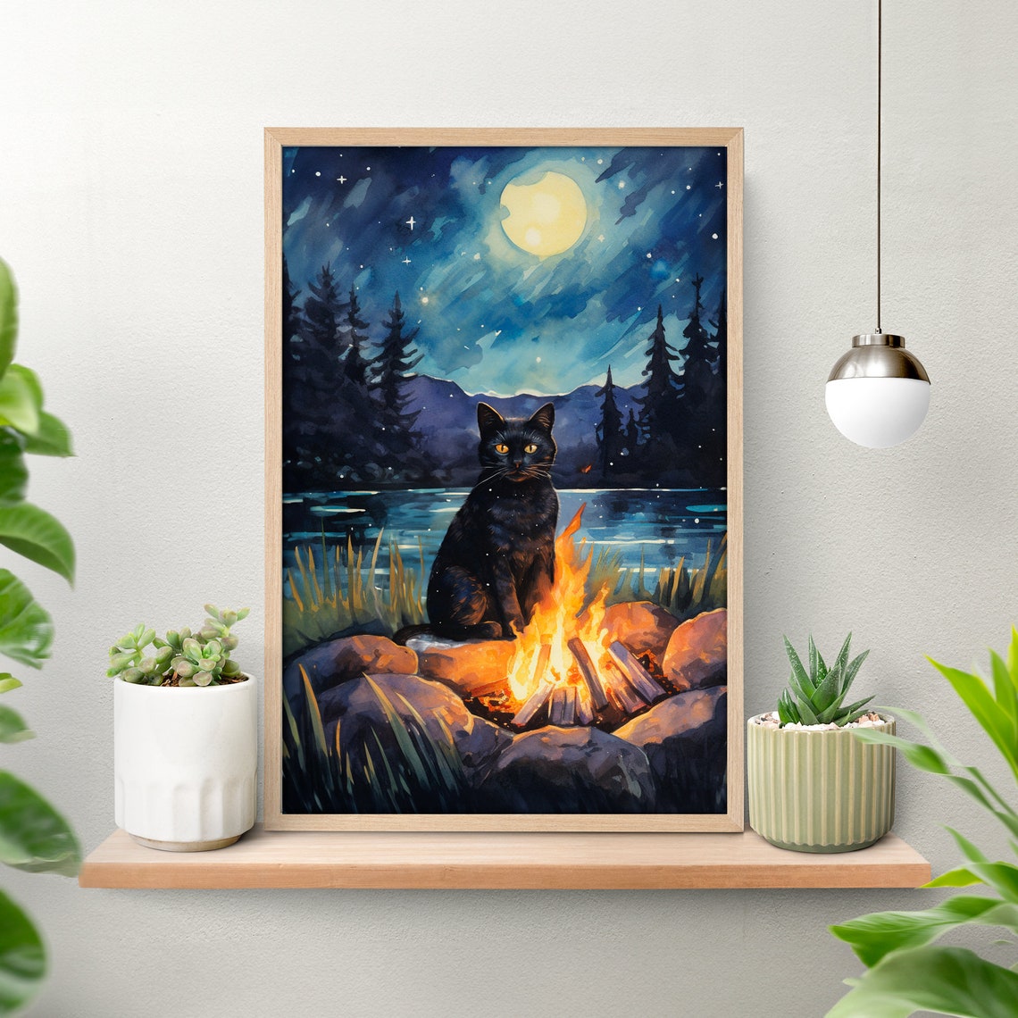 Black Cat by a Crackling Campfire Under a Moonlit Night Sky Poster