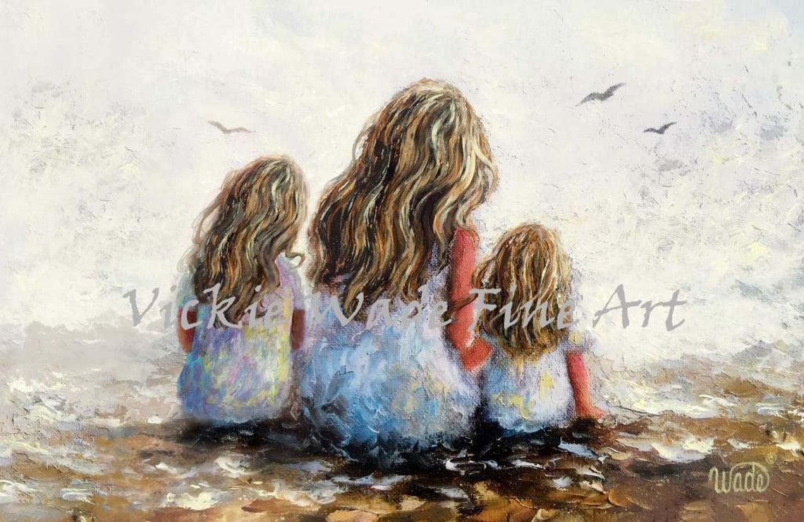 Mother And Two Daughters Sitting Together At The Beach Poster
