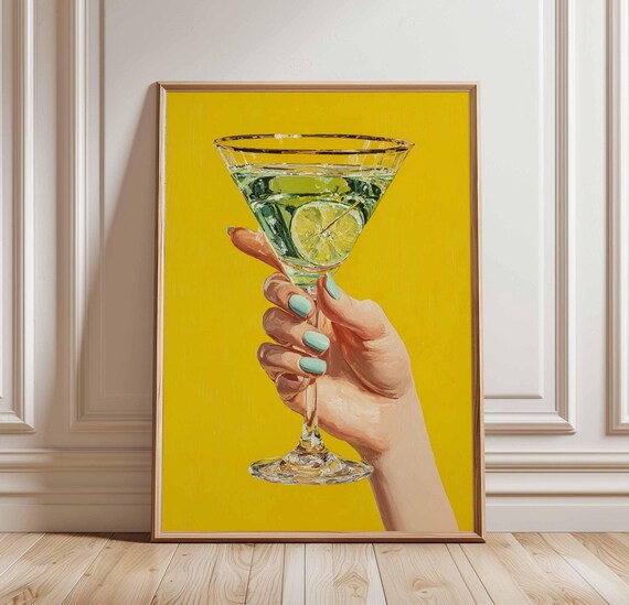 Hand Holding Lime Martini Cocktail On Bold Yellow Background Poster