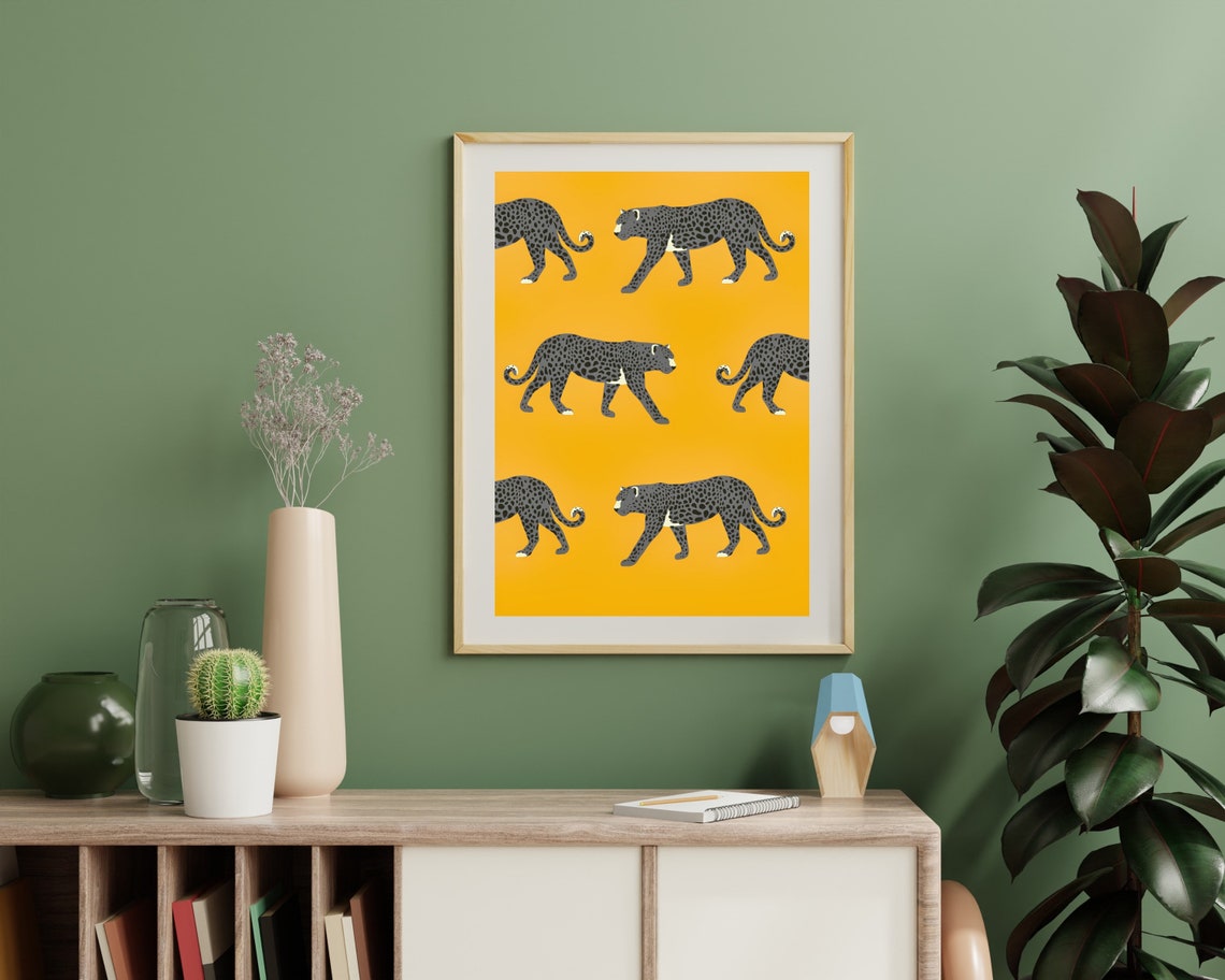 Stylized Grey Leopards Prowling Across a Mustard Yellow Poster - Image 2