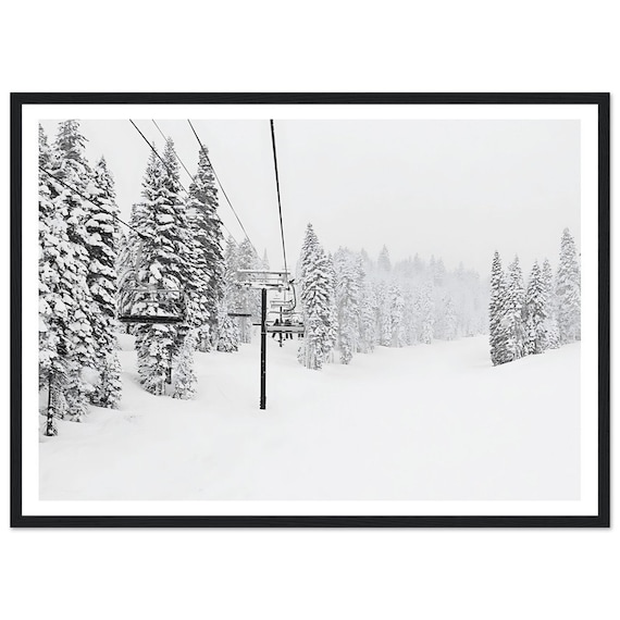 Black And White Ski Lift Rising Over Snowy Pine Forest Slope Poster