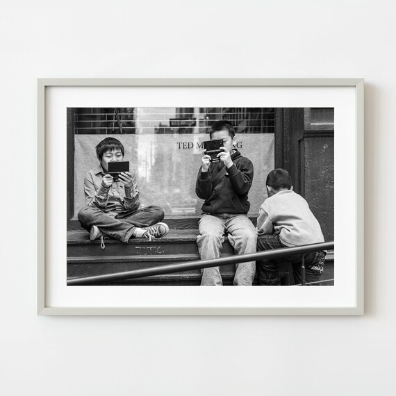 Boys Playing Handheld Games Black and White Street Photo Wall Art