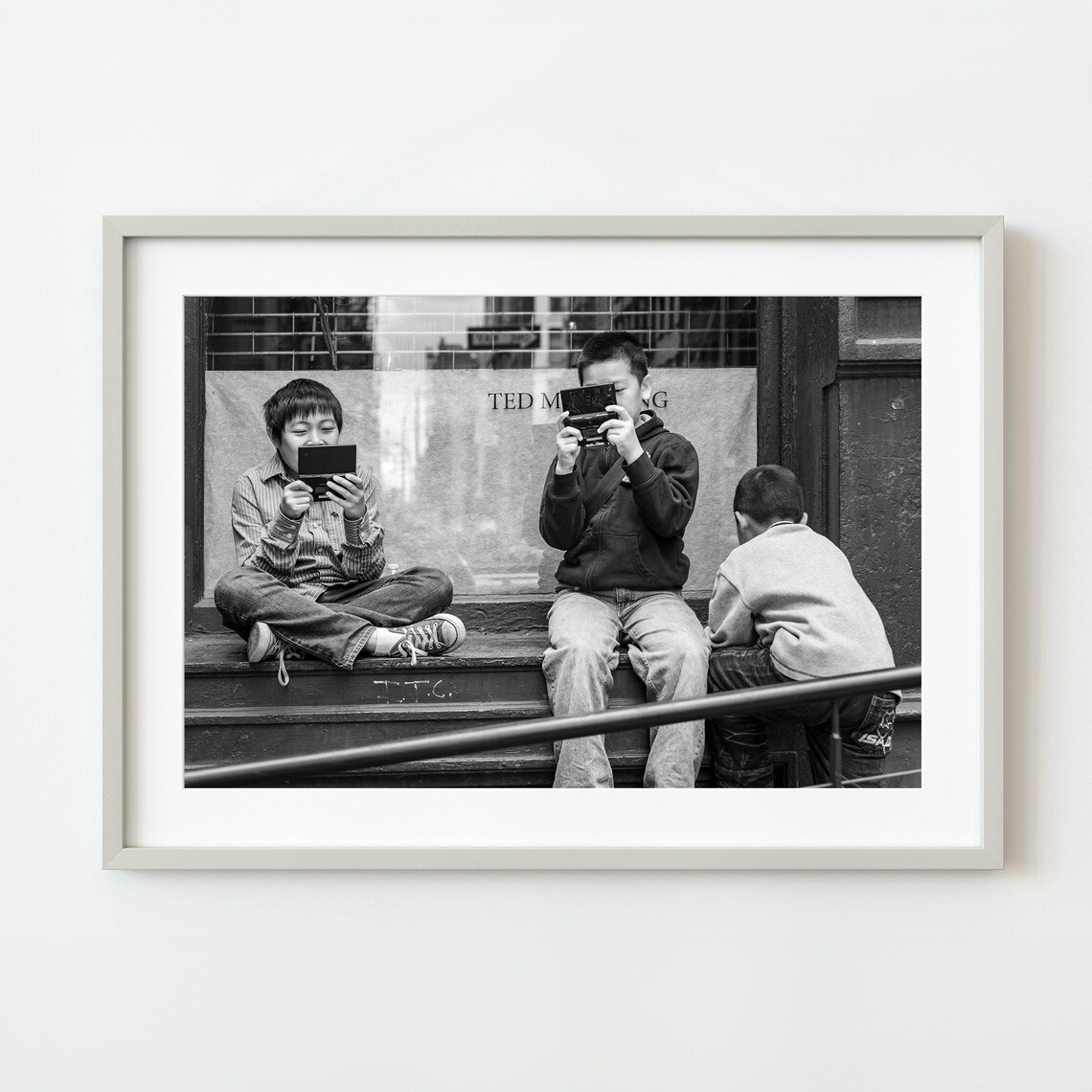 Boys Playing Handheld Games Black and White Street Photo Wall Art