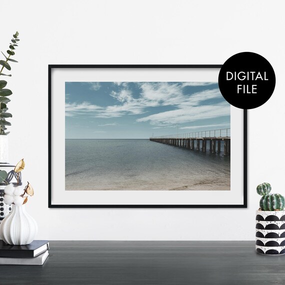 Calm Ocean Pier Under Cloudy Sky Serene Coastal Photography Print