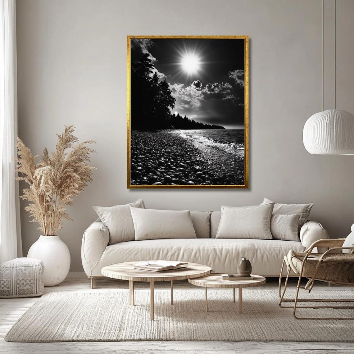 Black And White Pebble Beach With Radiant Sunburst And Waves Poster - Image 3