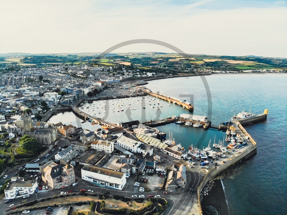 Aerial View of a Seaside Harbor Town with Marina at Golden Hour Poster - Image 3