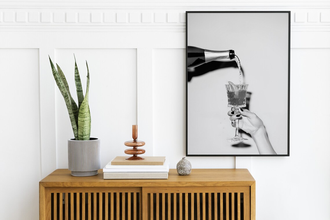 Woman Pouring Champagne into Coupe Glass Black White Photo Poster - Image 2