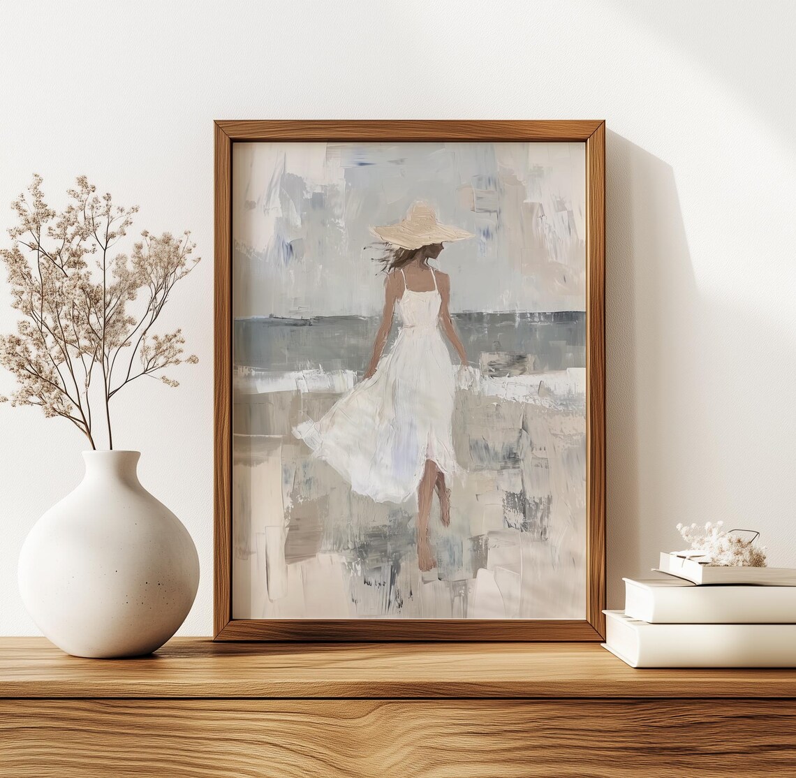 Woman in White Dress and Straw Hat on a Windy Beach Walk Poster - Image 3
