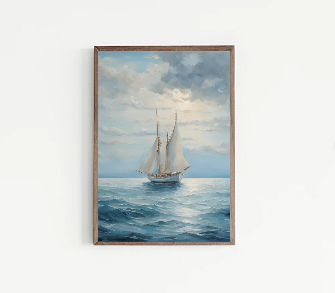 A Solitary Sailboat Gliding Across Open Ocean Under Clouds Poster