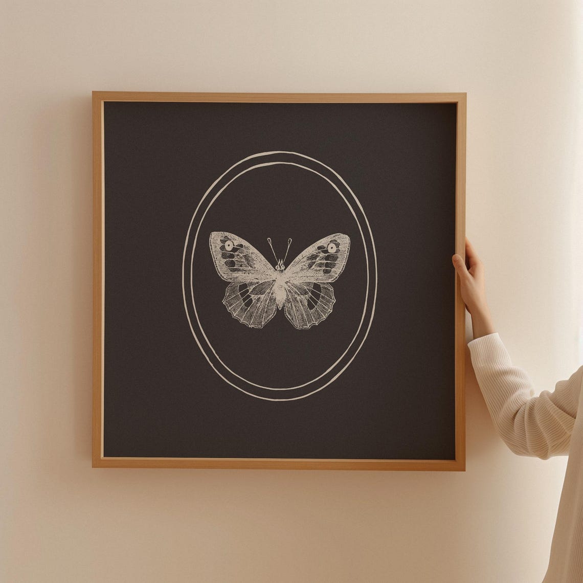 Dramatic White Butterfly Line Drawing on Black Oval Frame Poster - Image 2