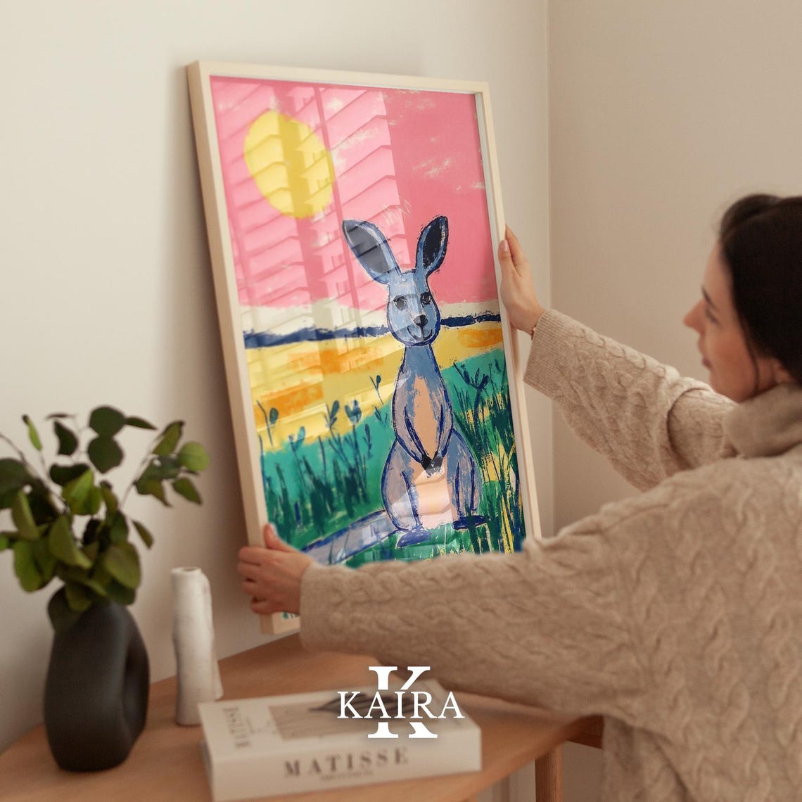 Smiling Blue Kangaroo Standing in Grass Under a Pink Sunset Poster - Image 2
