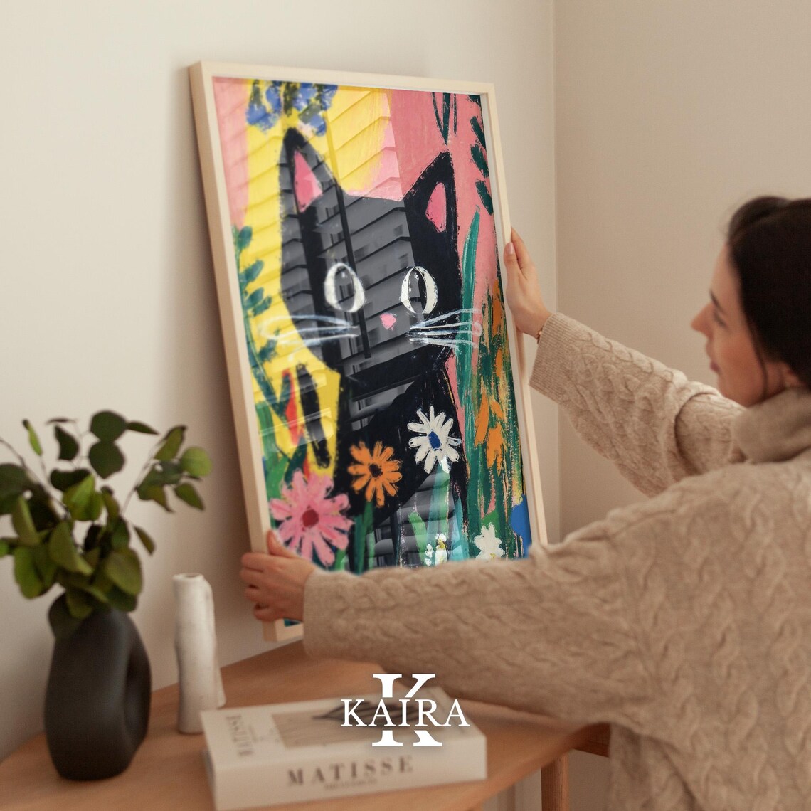 Wide-Eyed Black Kitten Sitting Among Bright Garden Flowers Poster - Image 2