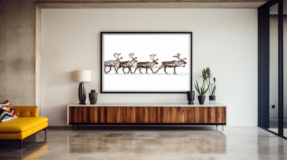 Four Reindeer Walking in a Row Across the Snowy Tundra Poster - Image 4