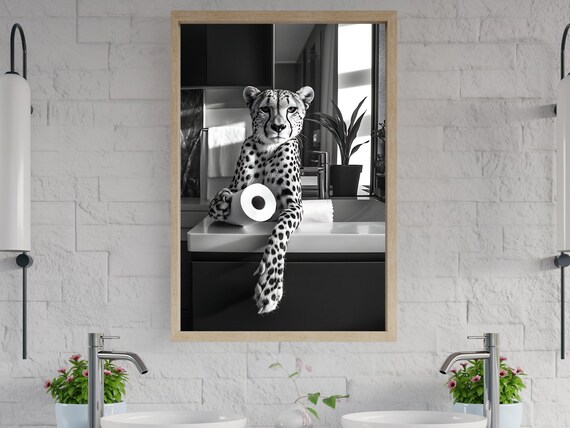 Cheetah Lounging on a Bathroom Counter With Toilet Paper Poster