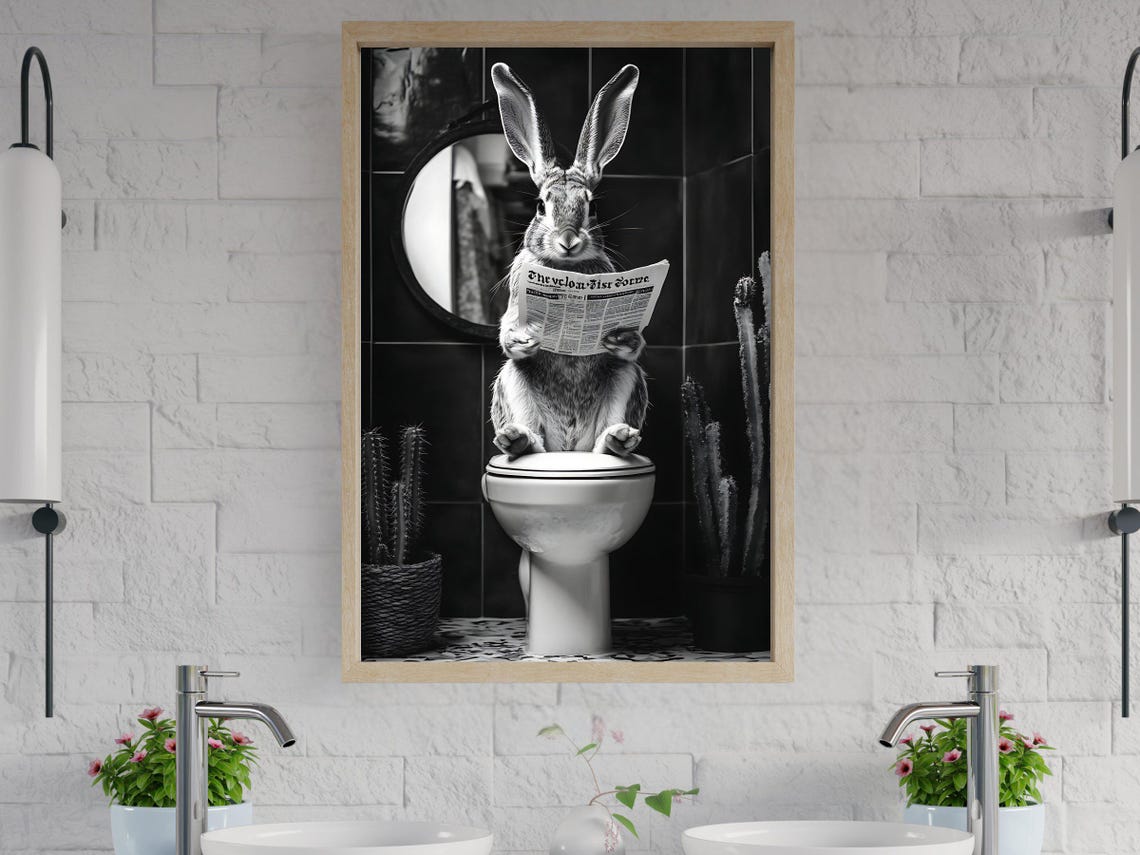 Rabbit Reading a Newspaper While Sitting on a White Toilet Poster
